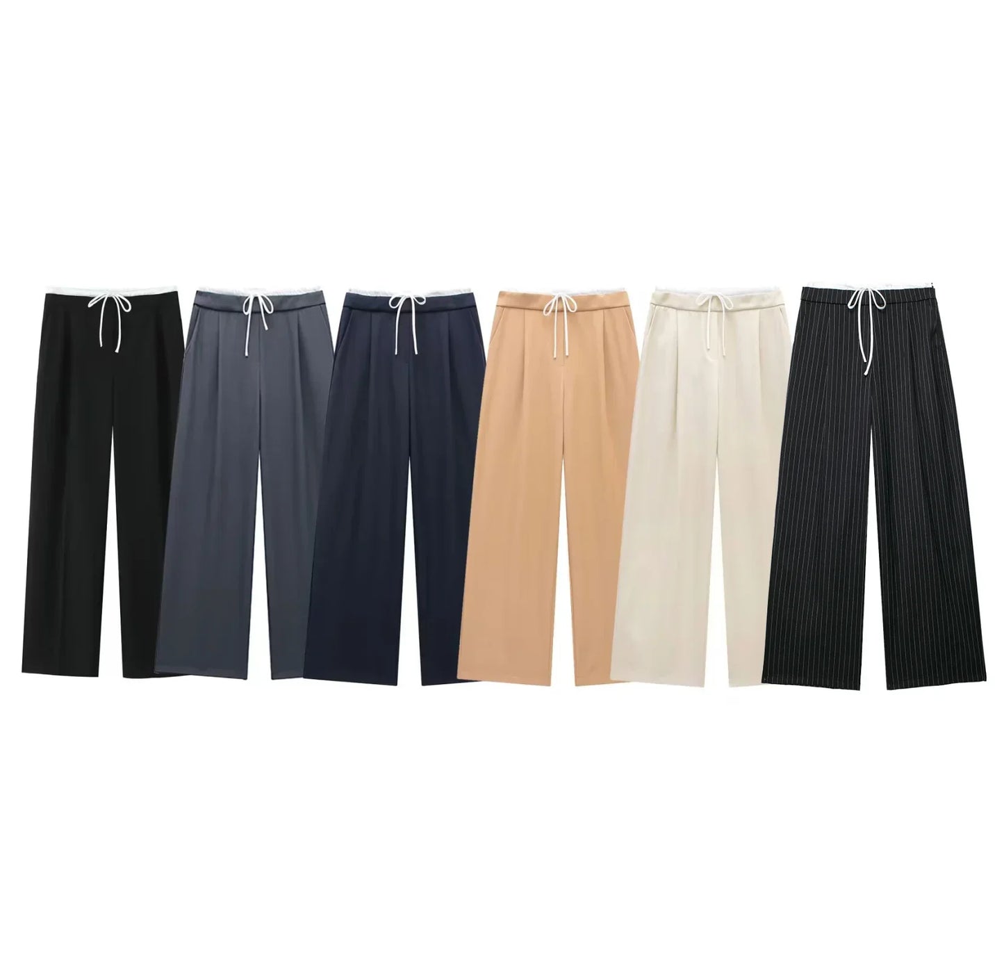 Made from soft, breathable fabric, it features a loose fit that elongates the silhouette, a high waist with drawstring adjustment, and a loose fit for maximum comfort. Ideal for casual looks, work, or leisure.