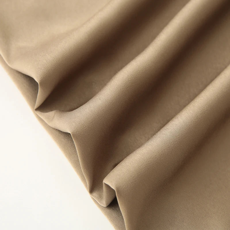 Made from lightweight, breathable fabric, it features a palazzo-style silhouette that elongates the silhouette, a high waistband that accentuates the waist, and an impeccable fit that guarantees sophistication for any occasion.