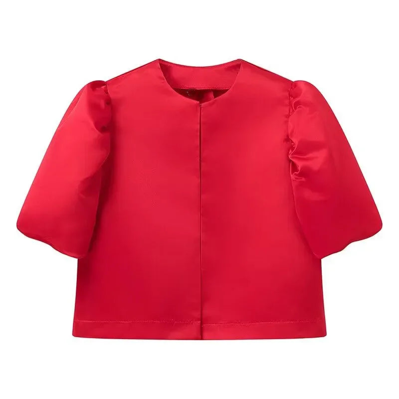 Dress in elegance, crafted from premium fabric, featuring modern puff sleeves, impeccable finish, and a cut that flatters the feminine silhouette. Perfect for versatile combinations—from workwear to special occasions.
