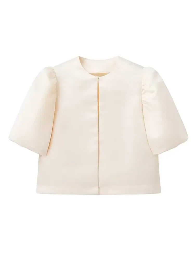 Dress in elegance, crafted from premium fabric, featuring modern puff sleeves, impeccable finish, and a cut that flatters the feminine silhouette. Perfect for versatile combinations—from workwear to special occasions.