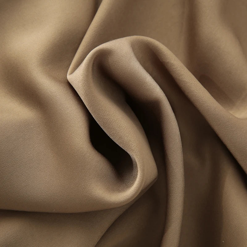 Made from lightweight, breathable fabric, it features a palazzo-style silhouette that elongates the silhouette, a high waistband that accentuates the waist, and an impeccable fit that guarantees sophistication for any occasion.