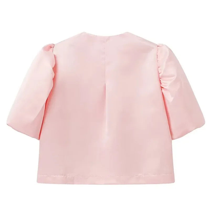 Dress in elegance, crafted from premium fabric, featuring modern puff sleeves, impeccable finish, and a cut that flatters the feminine silhouette. Perfect for versatile combinations—from workwear to special occasions.