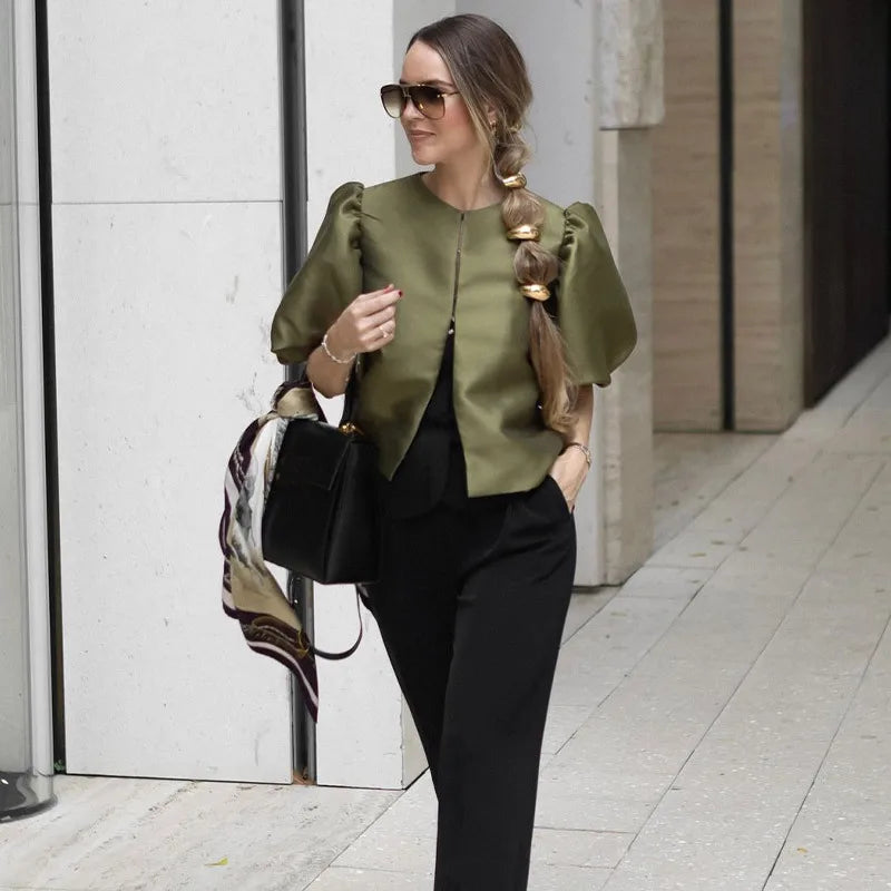 Dress in elegance, crafted from premium fabric, featuring modern puff sleeves, impeccable finish, and a cut that flatters the feminine silhouette. Perfect for versatile combinations—from workwear to special occasions.