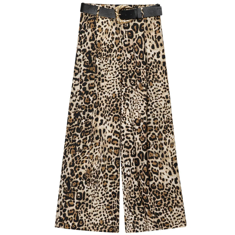 Made from lightweight, breathable fabric, it features a palazzo-style silhouette that elongates the silhouette, a high waistband that accentuates the waist, and an impeccable fit that guarantees sophistication for any occasion.