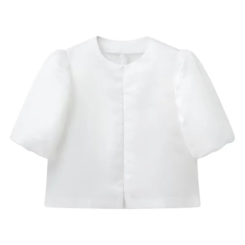 Dress in elegance, crafted from premium fabric, featuring modern puff sleeves, impeccable finish, and a cut that flatters the feminine silhouette. Perfect for versatile combinations—from workwear to special occasions.