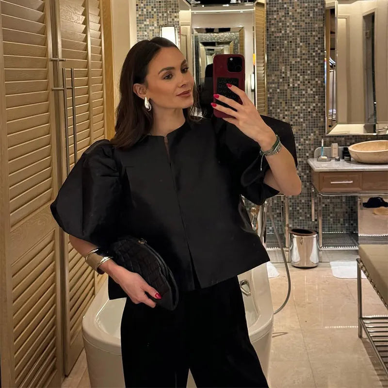 Dress in elegance, crafted from premium fabric, featuring modern puff sleeves, impeccable finish, and a cut that flatters the feminine silhouette. Perfect for versatile combinations—from workwear to special occasions.
