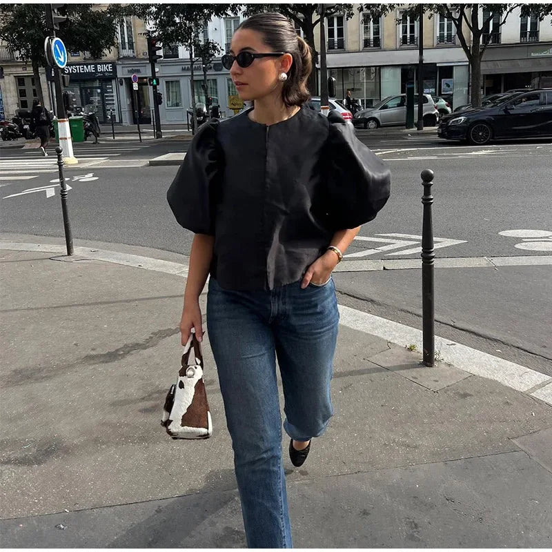 Dress in elegance, crafted from premium fabric, featuring modern puff sleeves, impeccable finish, and a cut that flatters the feminine silhouette. Perfect for versatile combinations—from workwear to special occasions.