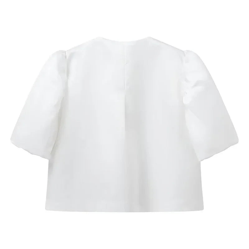 Dress in elegance, crafted from premium fabric, featuring modern puff sleeves, impeccable finish, and a cut that flatters the feminine silhouette. Perfect for versatile combinations—from workwear to special occasions.