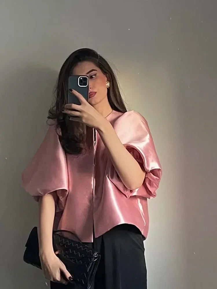 Dress in elegance, crafted from premium fabric, featuring modern puff sleeves, impeccable finish, and a cut that flatters the feminine silhouette. Perfect for versatile combinations—from workwear to special occasions.