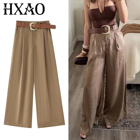 Made from lightweight, breathable fabric, it features a palazzo-style silhouette that elongates the silhouette, a high waistband that accentuates the waist, and an impeccable fit that guarantees sophistication for any occasion.