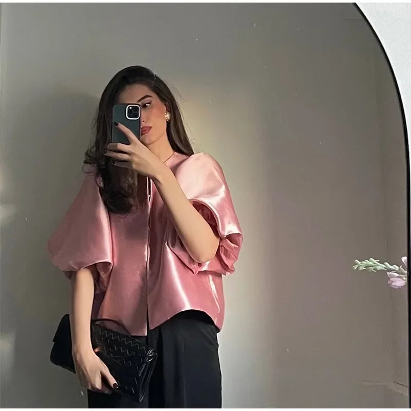 Dress in elegance, crafted from premium fabric, featuring modern puff sleeves, impeccable finish, and a cut that flatters the feminine silhouette. Perfect for versatile combinations—from workwear to special occasions.