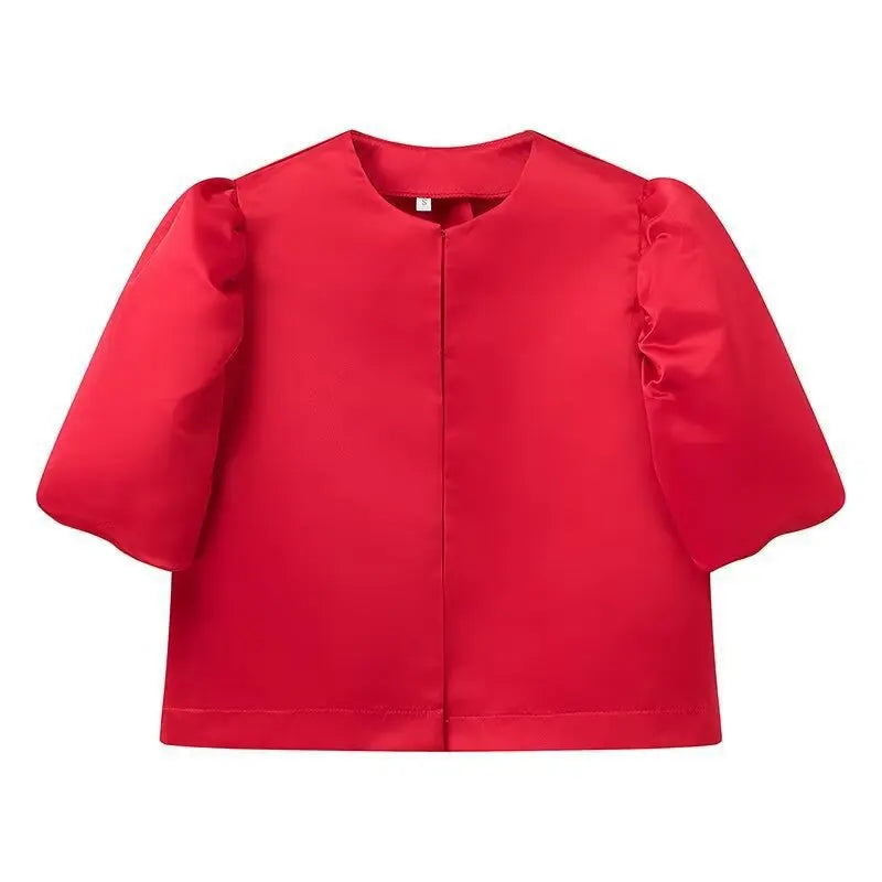 Dress in elegance, crafted from premium fabric, featuring modern puff sleeves, impeccable finish, and a cut that flatters the feminine silhouette. Perfect for versatile combinations—from workwear to special occasions.