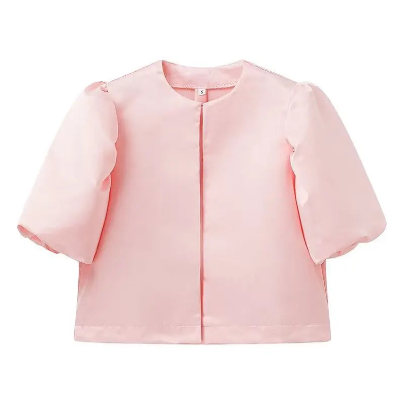 Dress in elegance, crafted from premium fabric, featuring modern puff sleeves, impeccable finish, and a cut that flatters the feminine silhouette. Perfect for versatile combinations—from workwear to special occasions.